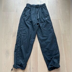 Nike Dri Fit sweatpants with pockets.